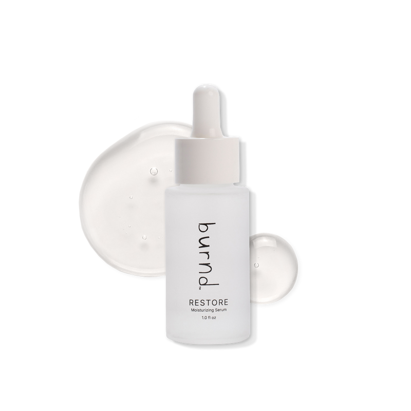 Restore serum bottle labeled 'bund' with a dropper on a black background
